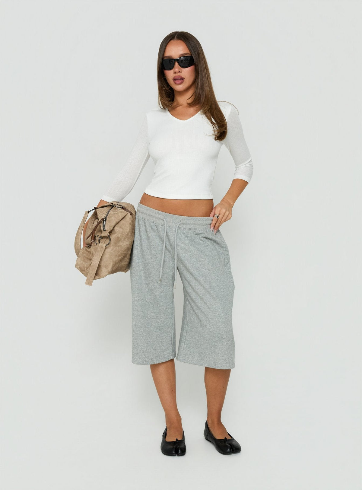 #NOVERA - Top Sofelia Blanco de Punto Calado con Cuello en V -