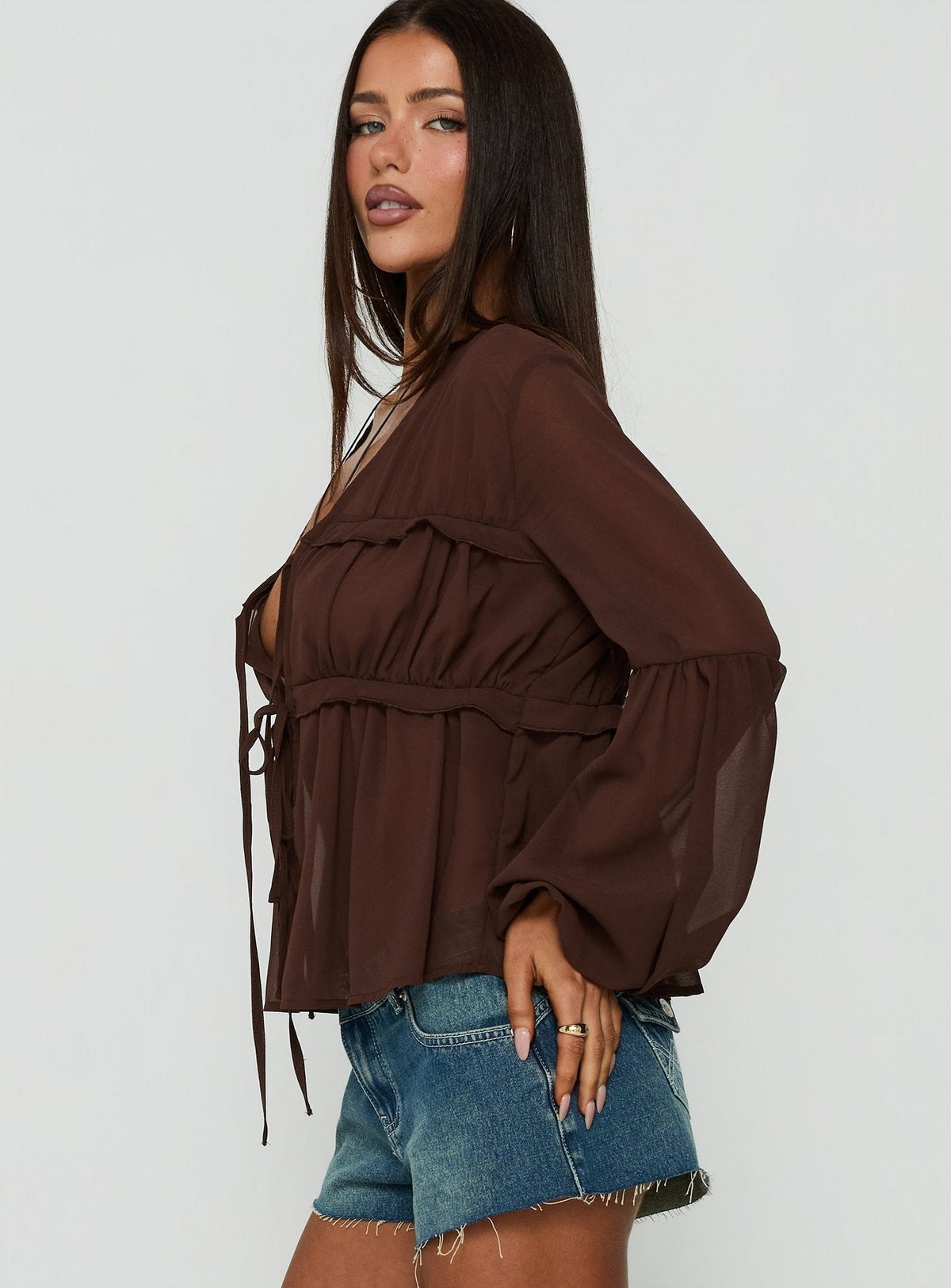 #NOVERA - Top Grazalema Chocolate Transparente de Manga Larga -